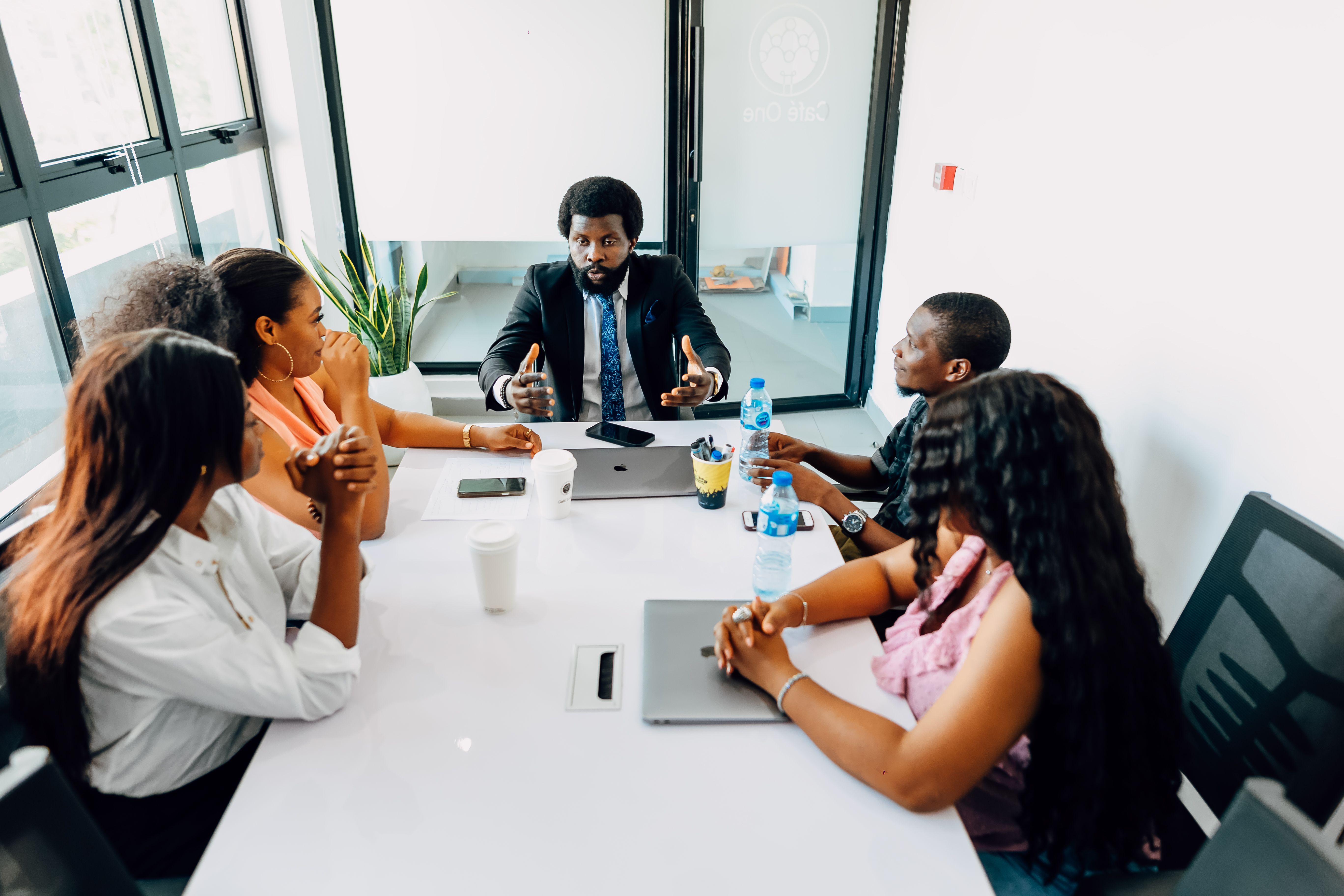 Nigerian marketing professionals reviewing strategy and campaign direction in a Lagos office